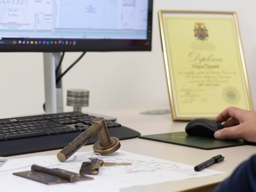 Expertly training and qualified, a diploma for ironmongery sits proudly on a desk in the Turnstyle Designs office.